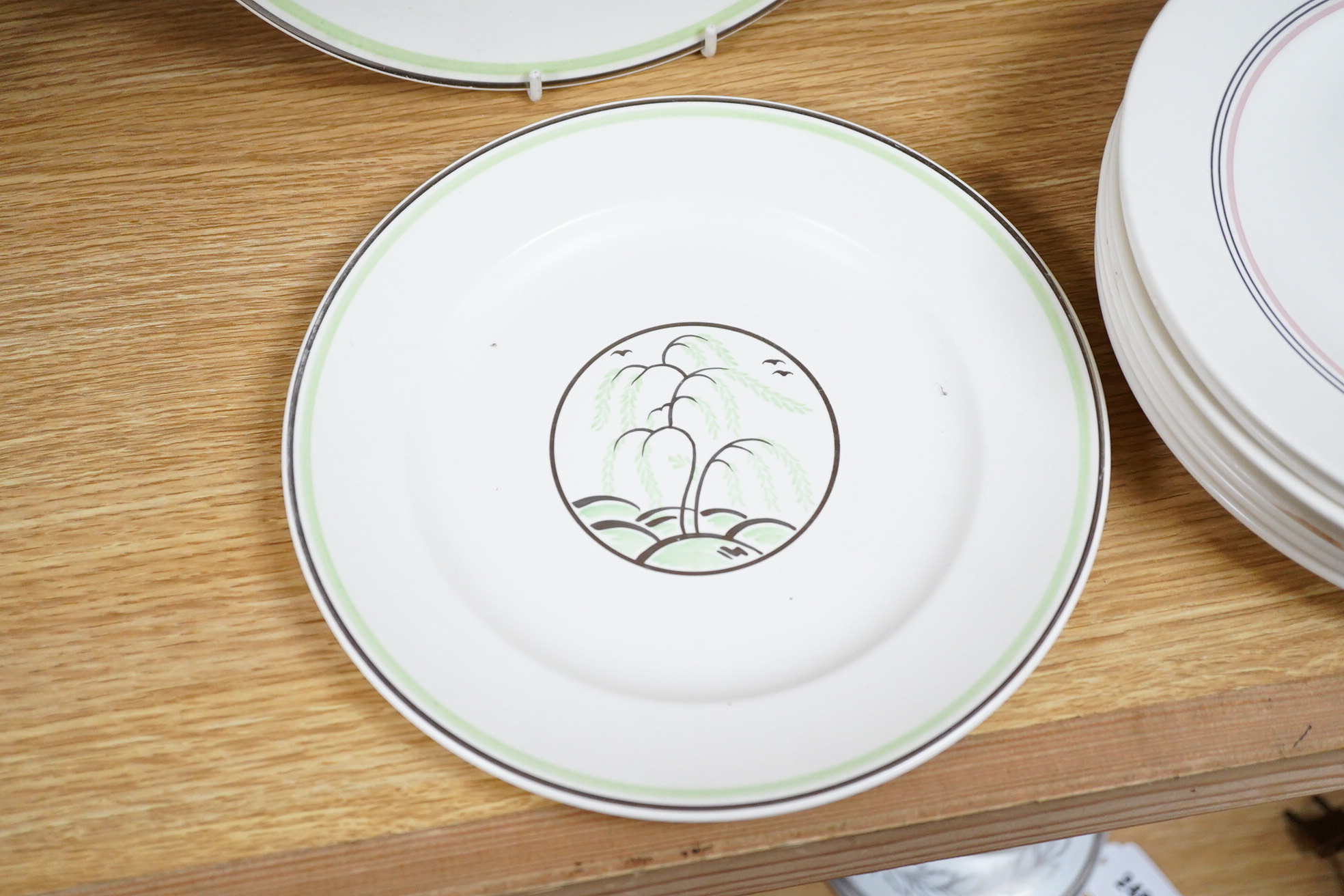 Keith Murray for Wedgwood, moonstone weeping willow, two plates and eight similar examples, largest 26cm in diameter